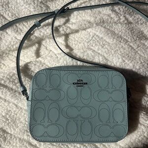 Coach Blue Embossed Crossbody Bag with Textured Design